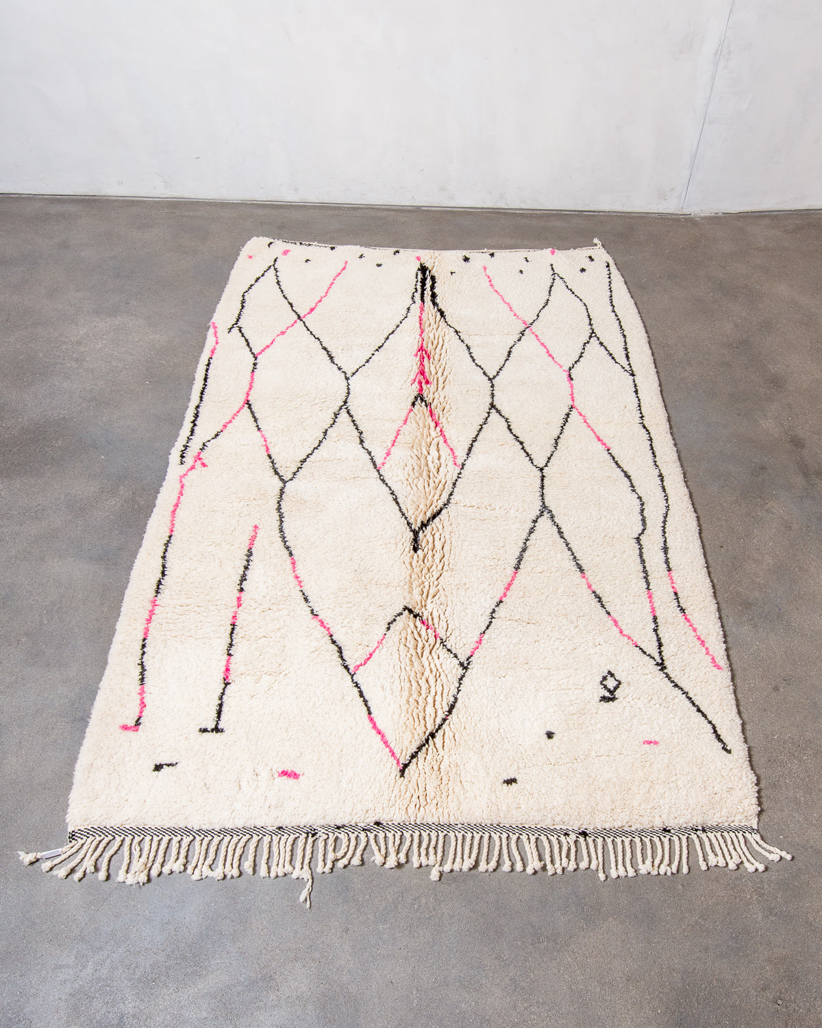 Modern, designer, handcrafted Berber rug from Morocco. Beniourain carpet with minimalist design, natural wool pile and a fluffy texture.